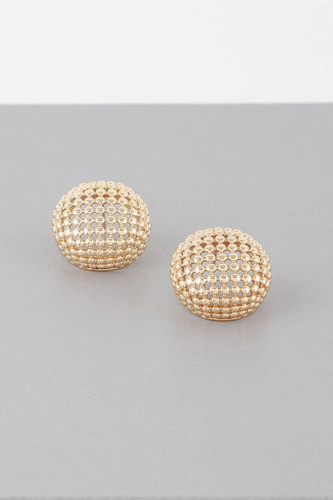 Beaded dome stud earrings in gold tone, round front with clustered bead pattern