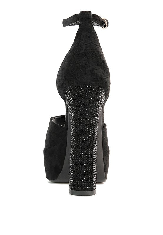Black suede sandals with studded heel, ankle strap, and platform wedge