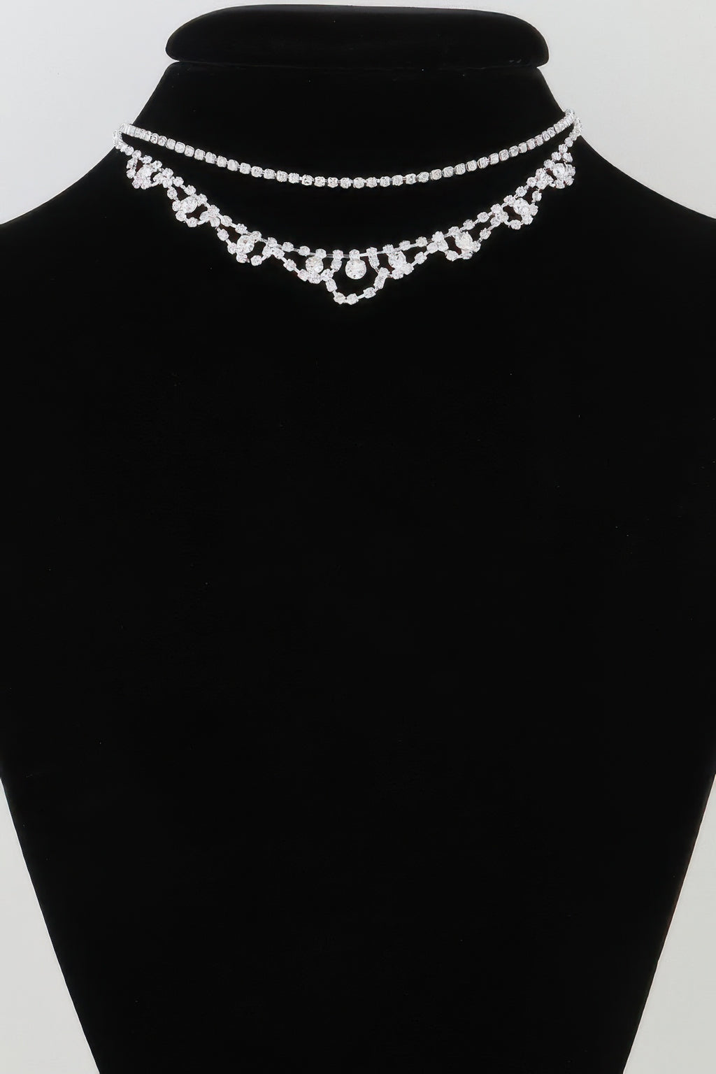Silver rhinestone choker and drop pendant necklace on bust
