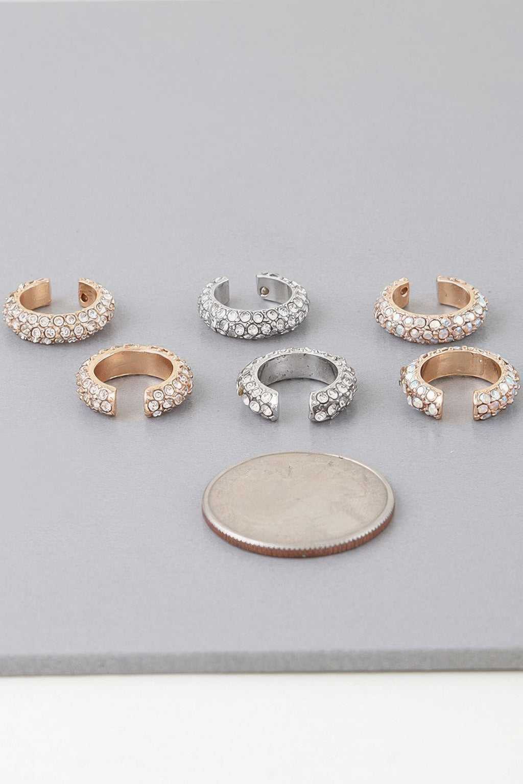 Gold- and silver-tone bejeweled ear cuffs with clear stones (set shown)