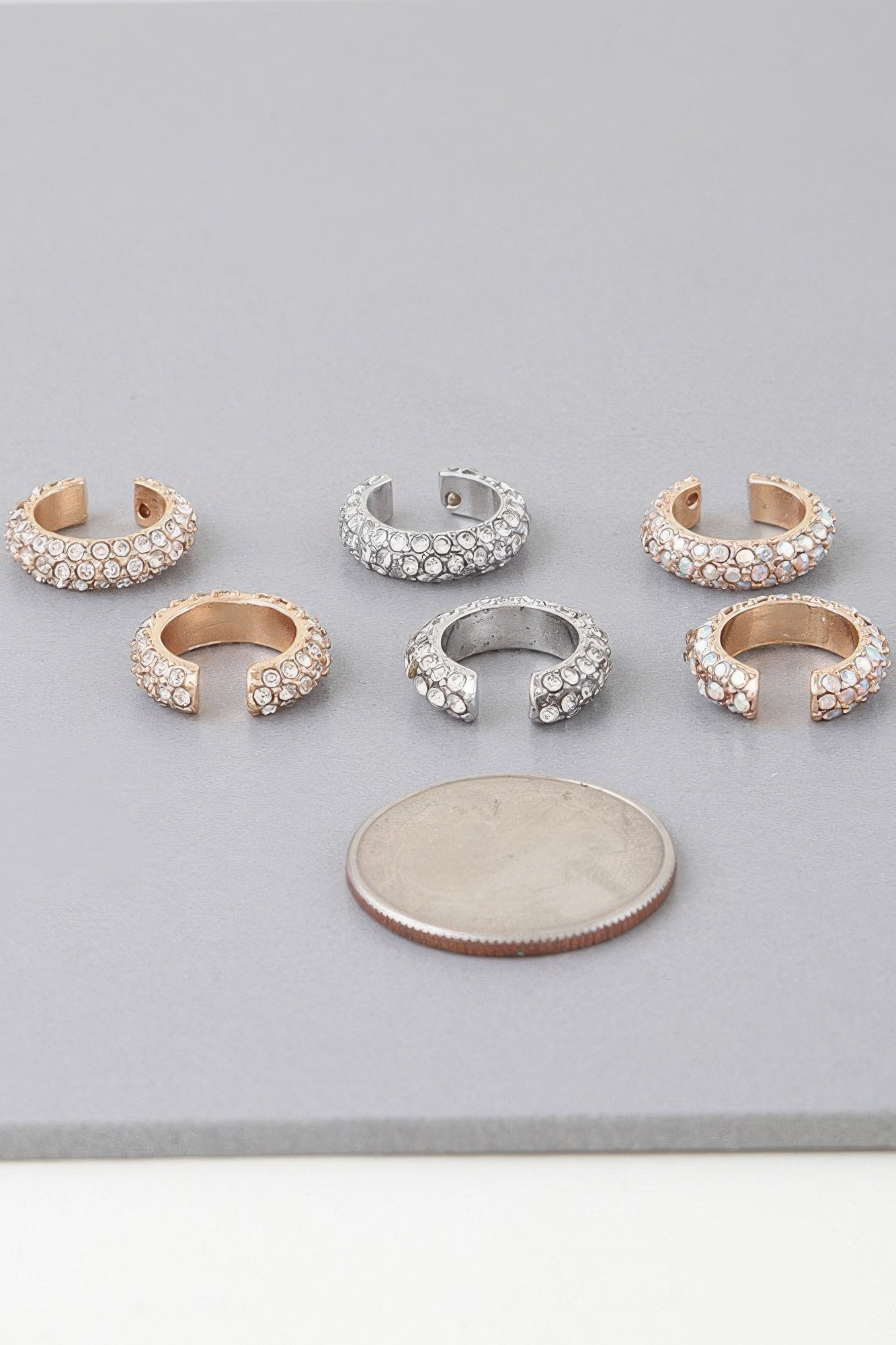 Gold- and silver-tone bejeweled ear cuffs with clear stones (set shown)