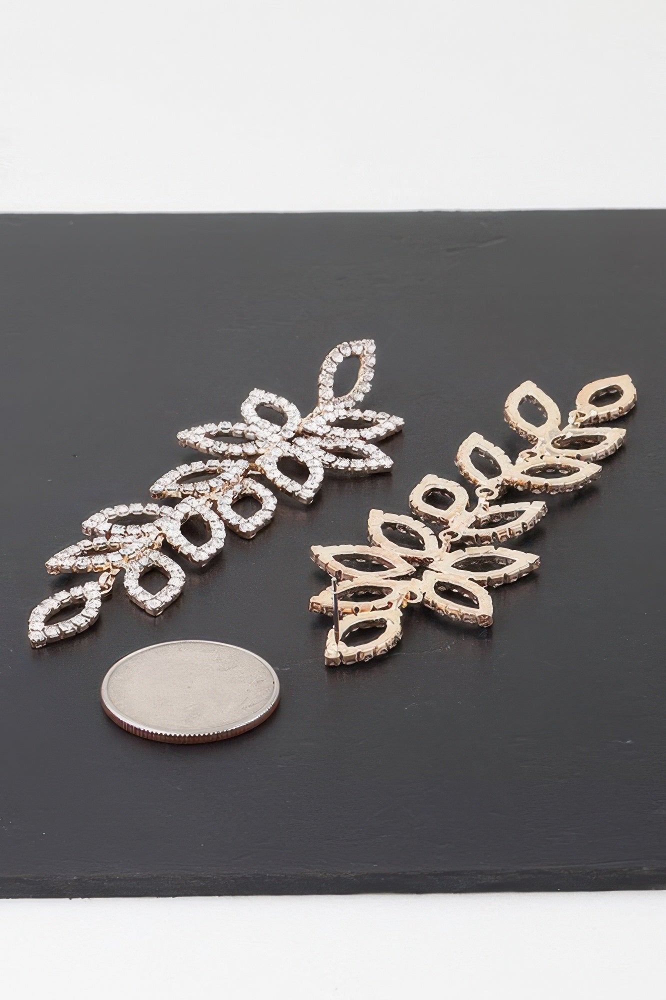 Silver-tone flower petal drop earrings with clear teardrop crystals, with scale coin