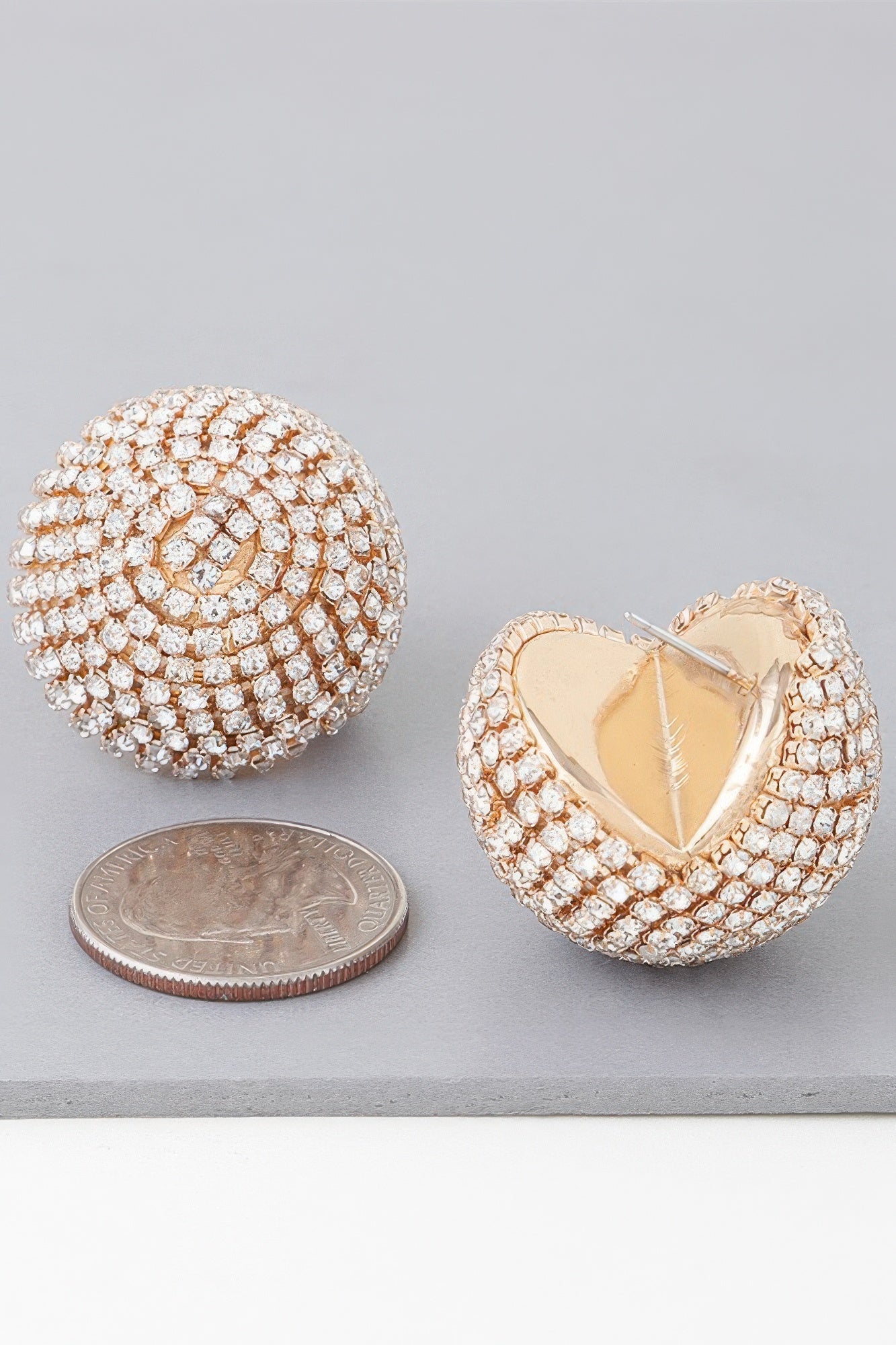 Rhinestone disco earrings in gold clear, round discs with visible back and coin size