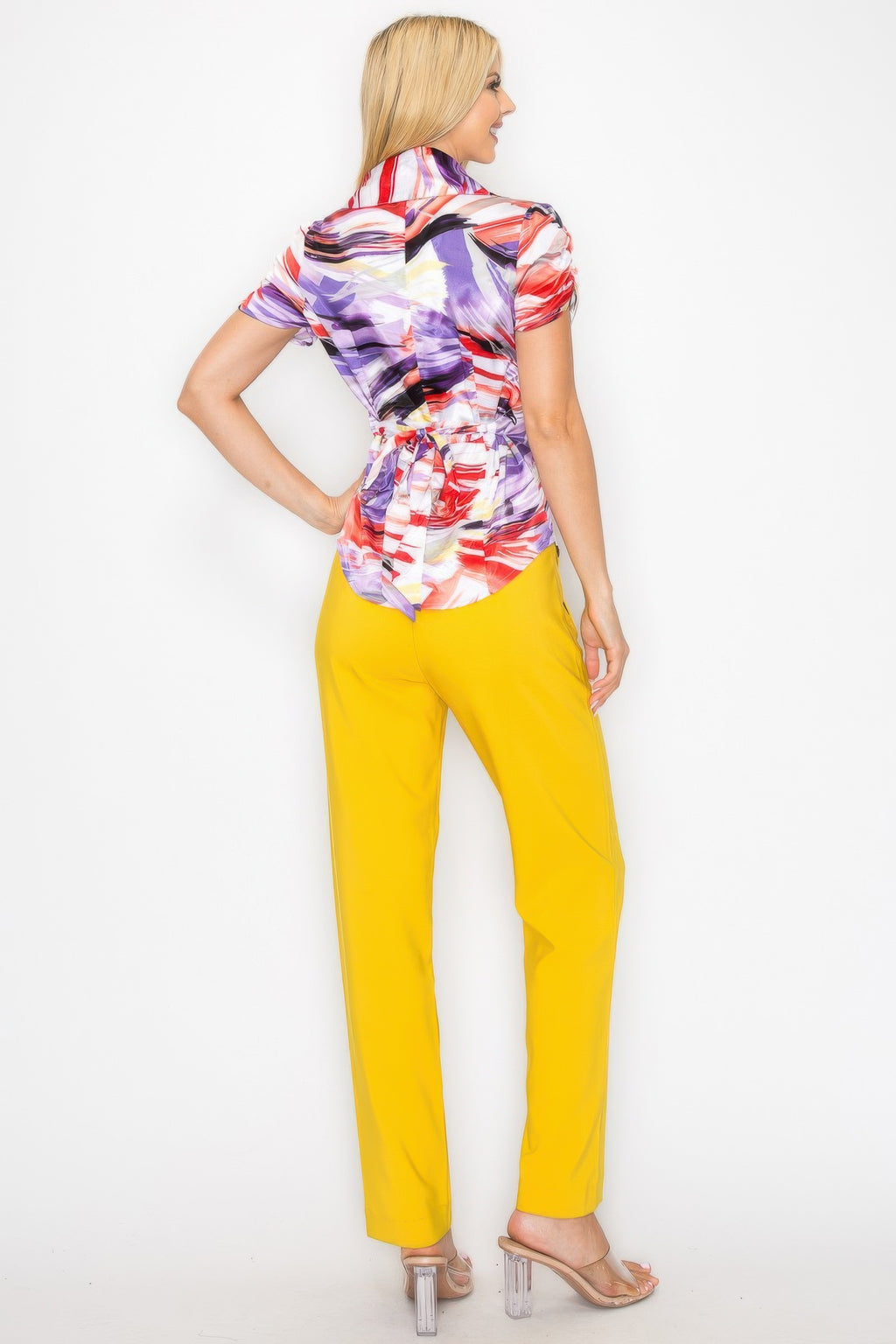 Watercolor blouse back view: short sleeves, belted waist seam, snap-button front, purple-red print