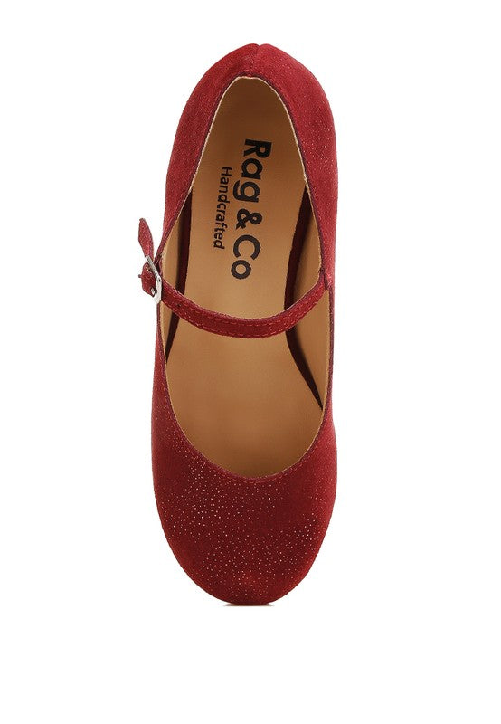 Burgundy suede Mary Jane shoe with buckle strap and rounded toe