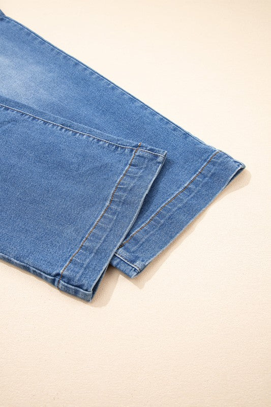 Straight-leg jeans hem with folded cuff and visible stitching