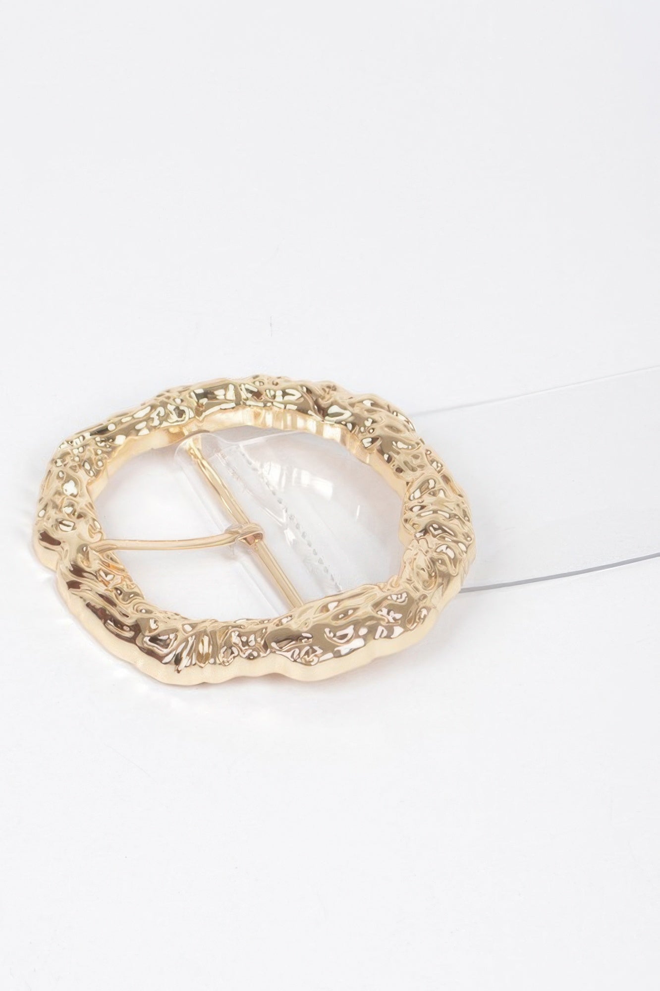 Ornate gold-tone round buckle with clear insert on plus-size belt, one size