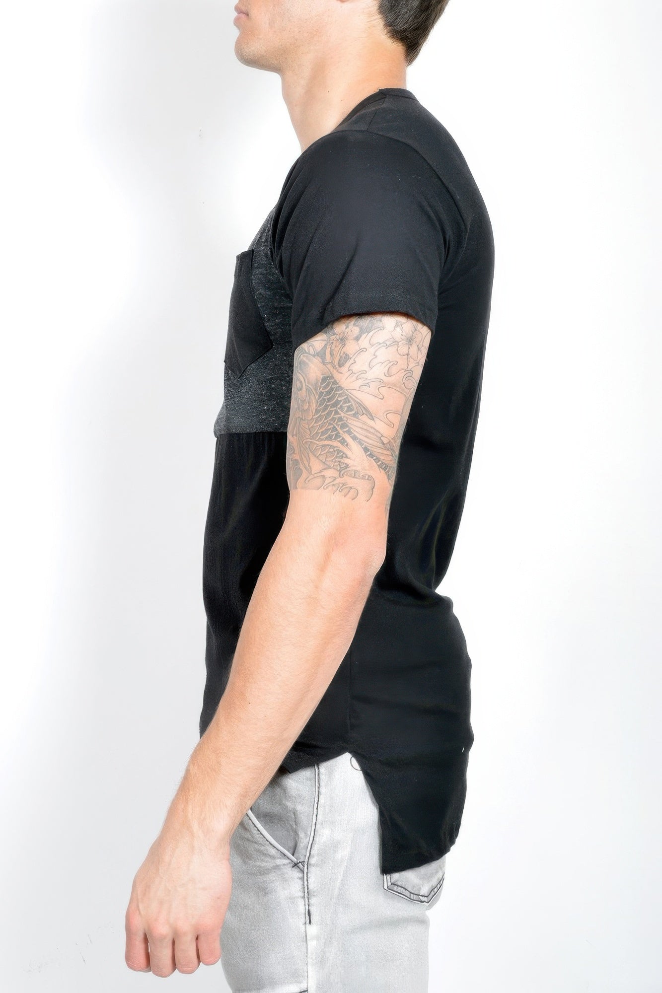 Side view: black mens T-shirt with gray chest panel and black pocket