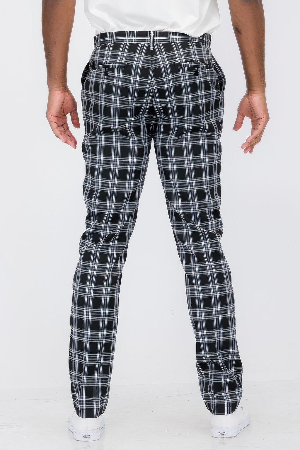 Black plaid trouser pants, back view with pleated seat and cuffed hems