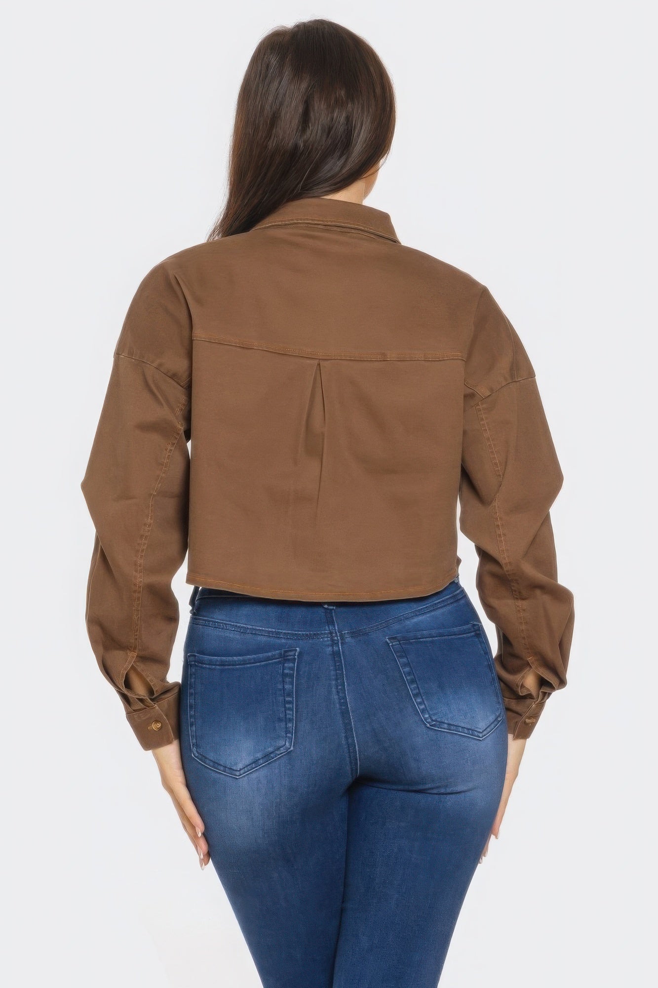 Back view: brown denim button-down shirt with yoke and cuffed long sleeves