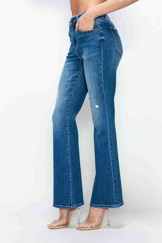 Medium blue high-rise bootcut jeans with hand pockets and light distressing