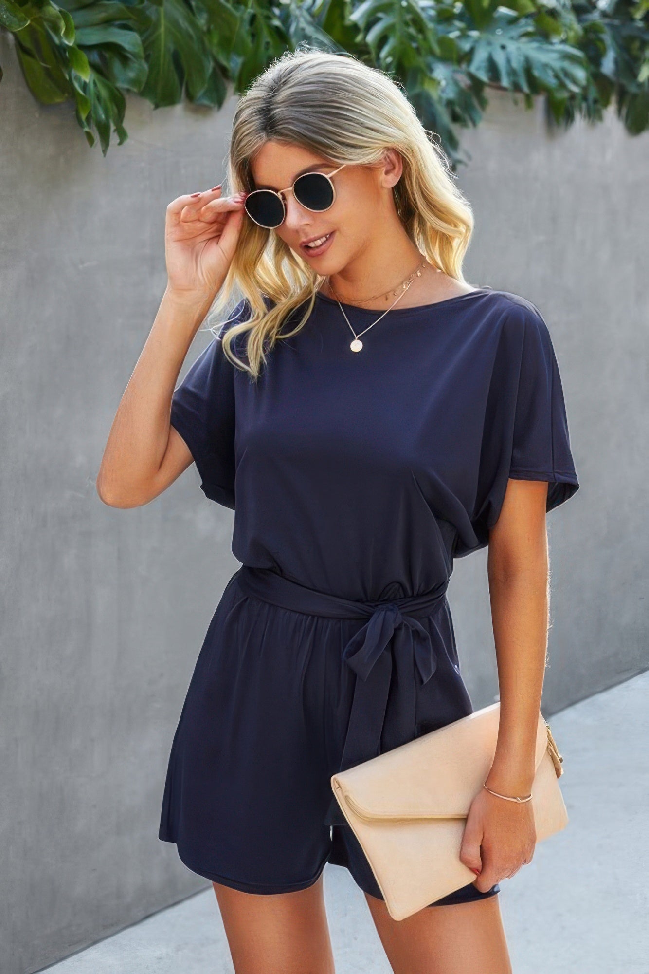 Navy boat-neck romper with waist tie, loose fit, short sleeves