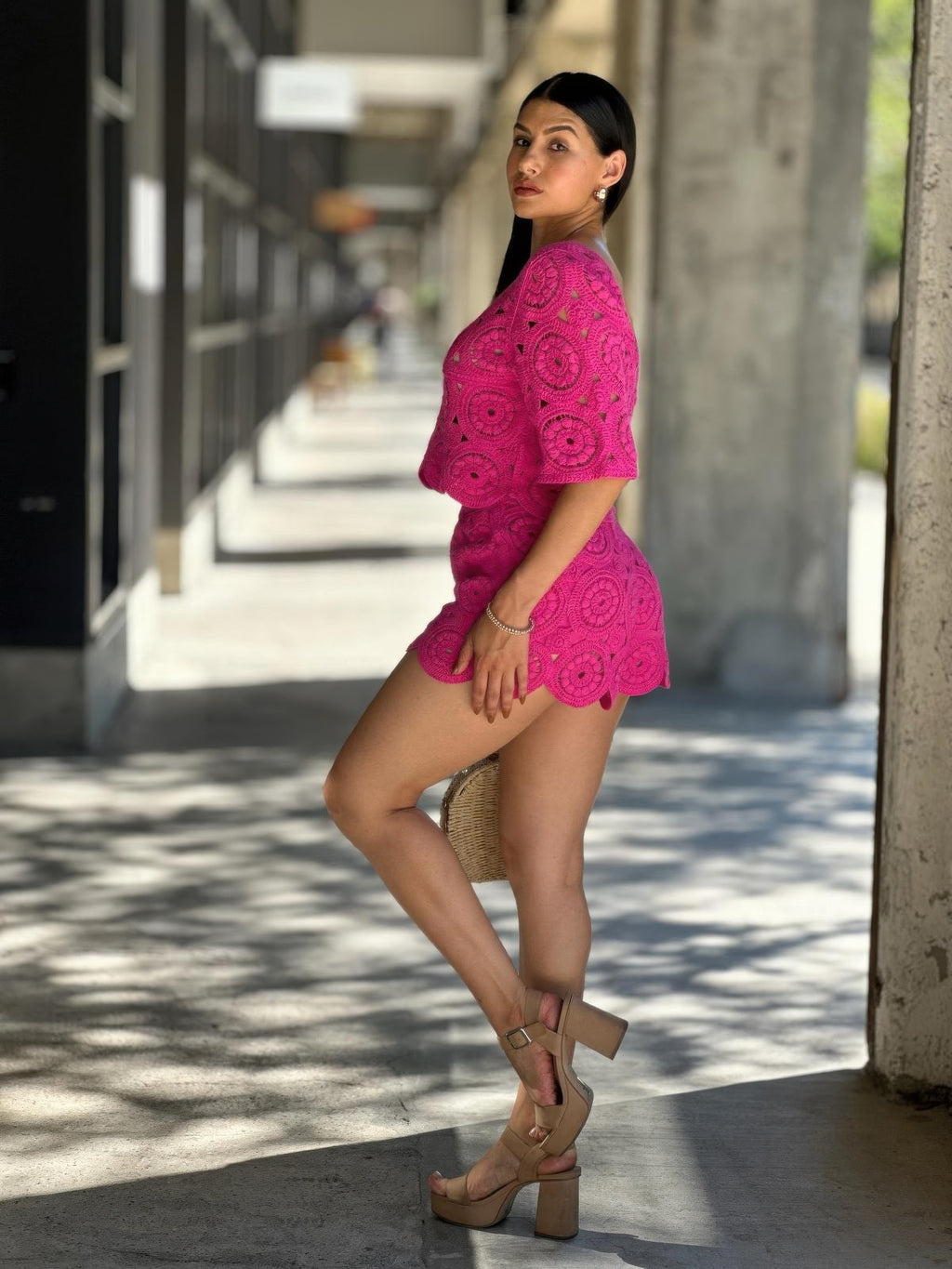 Side view: fuchsia crochet lace crop top and matching scalloped shorts set