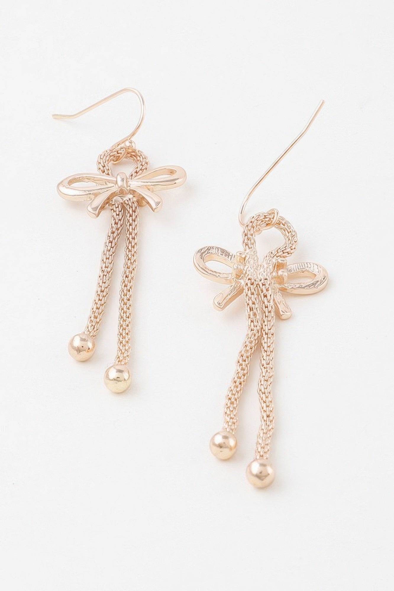 Gold ribbon drop earrings: dangling beaded box chains from bow loops