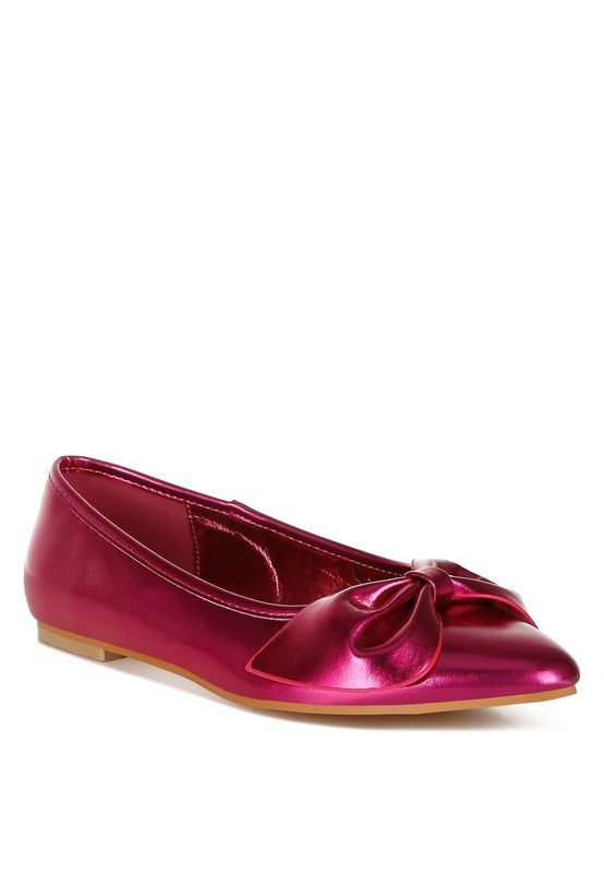 Fuchsia metallic ballerinas with oversized bow at the toe