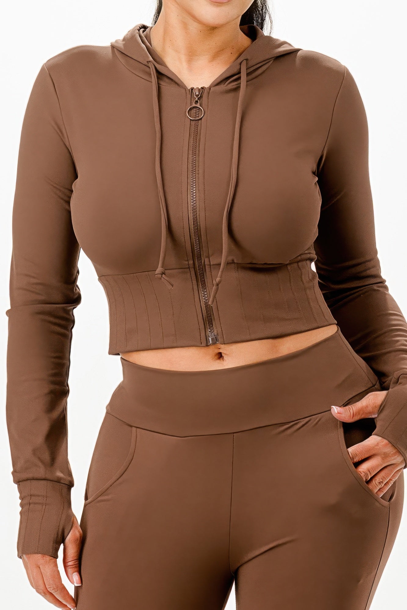 Close-up: brown zip crop hoodie with drawstring and matching flare pants waistband