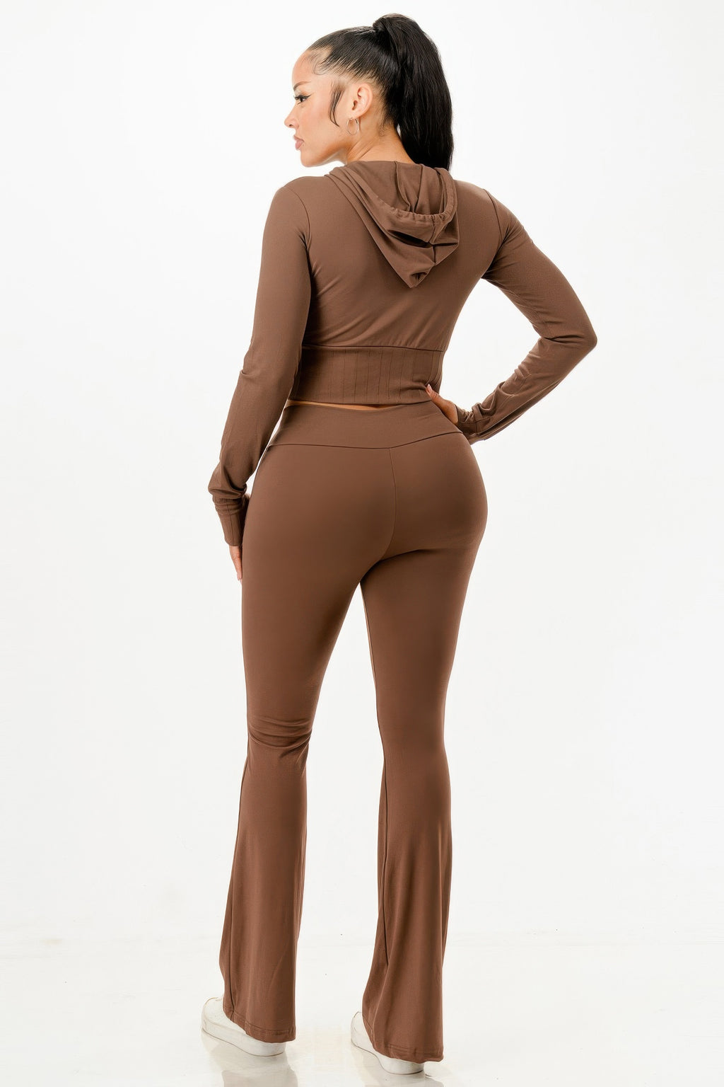 Brown crop hoodie with hood and flare pants, back view