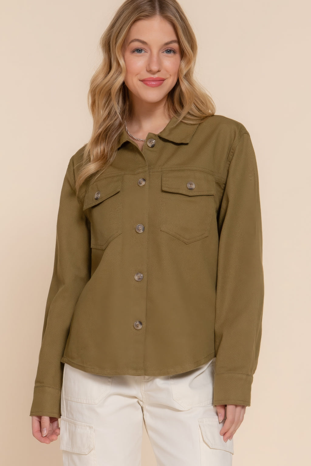 Olive button-down denim shacket with chest pockets and covered button placket