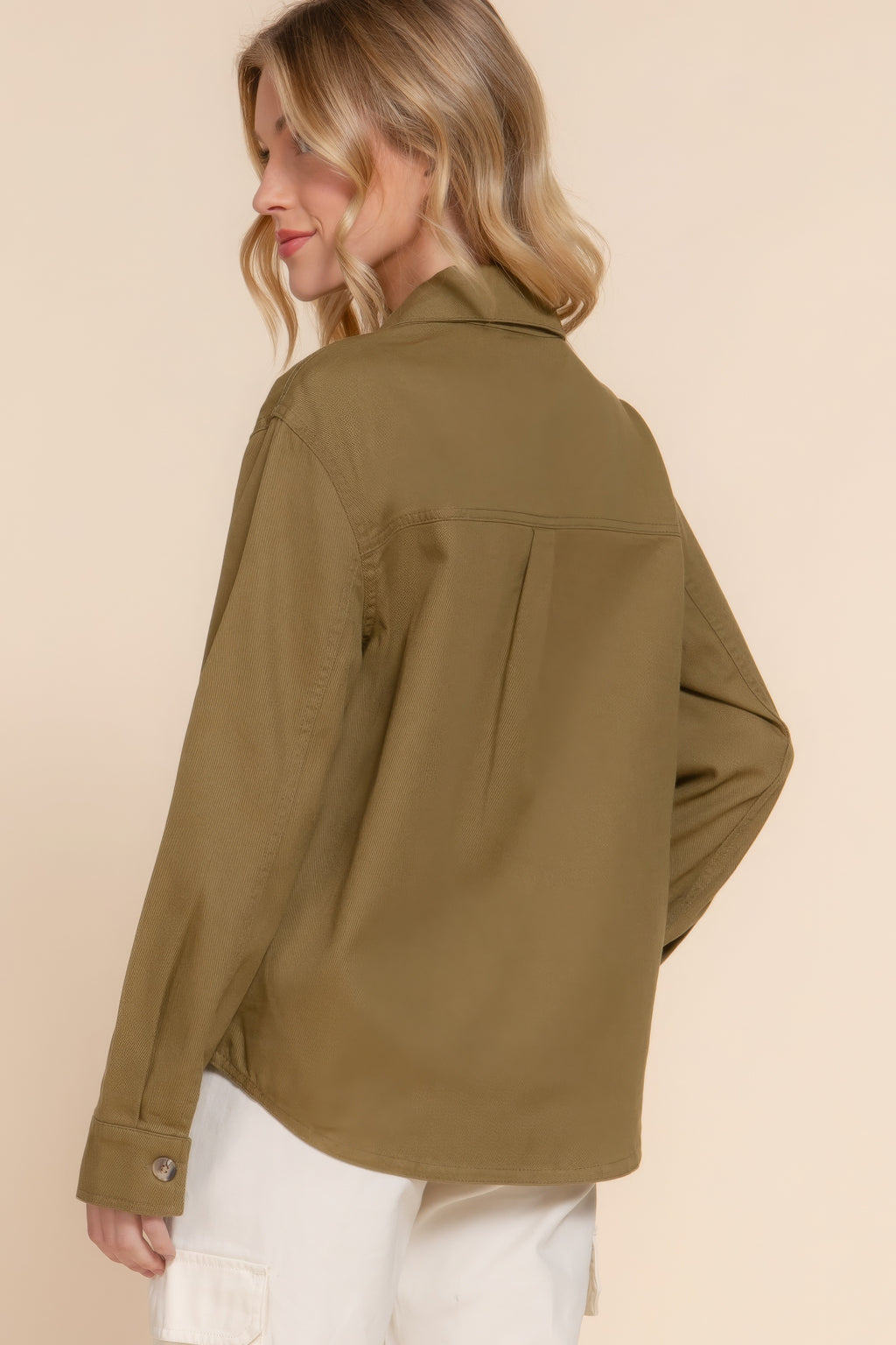 Olive denim shacket back view with yoke seam and long sleeve