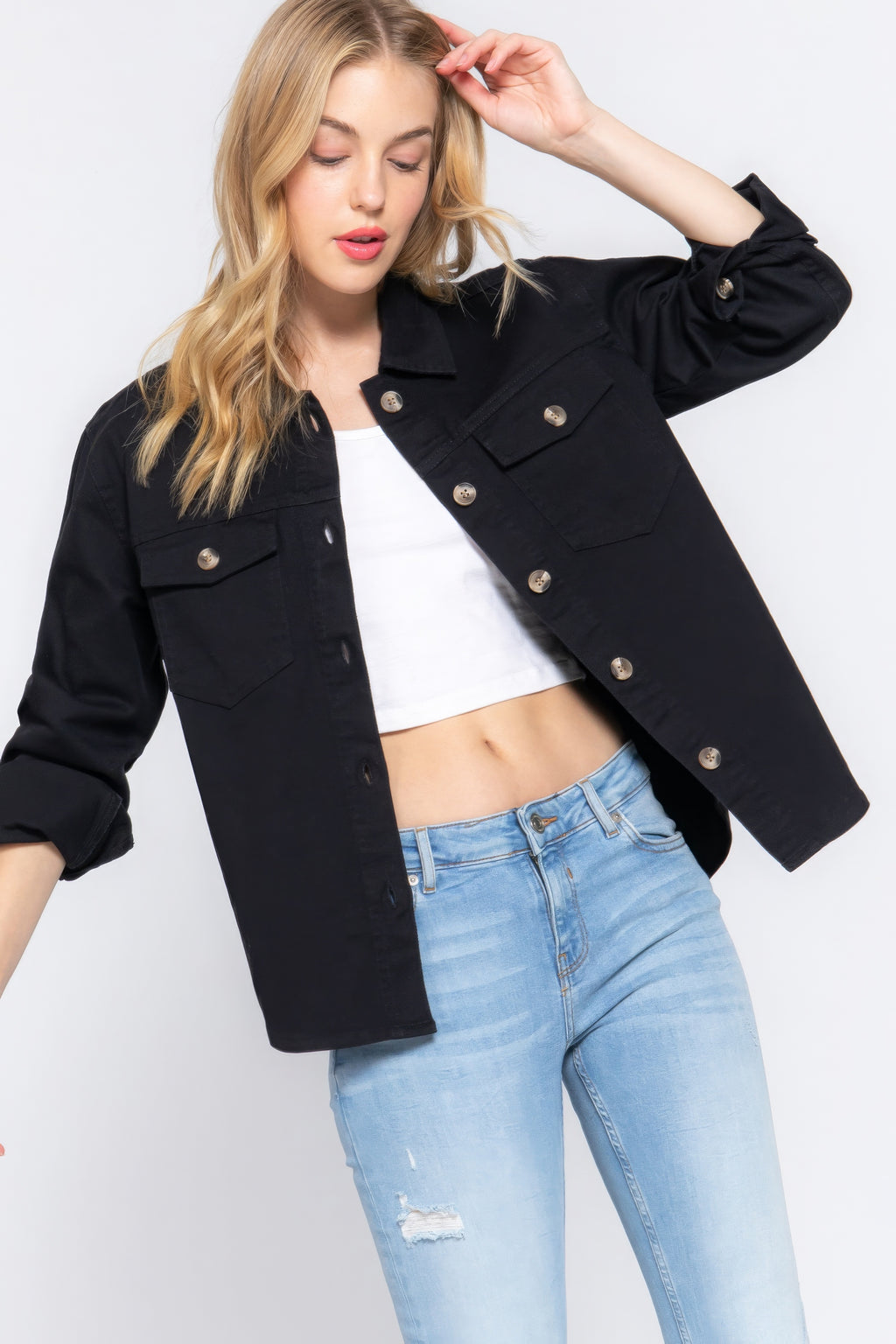 Black cotton denim shacket with button-front and chest flap pockets, long sleeves