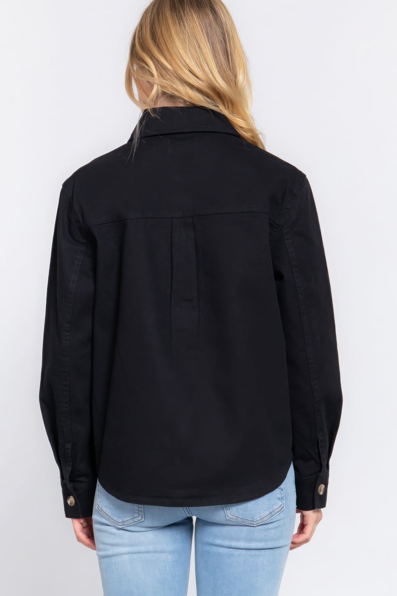 Black cotton denim shacket back view with buttoned yoke and long sleeves, patch pockets