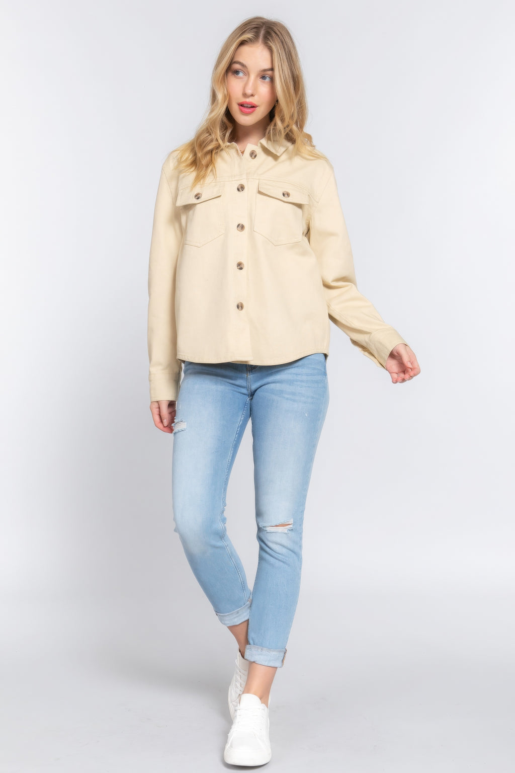 Taupe cotton denim shacket front view with button closure and flap pockets, long sleeves