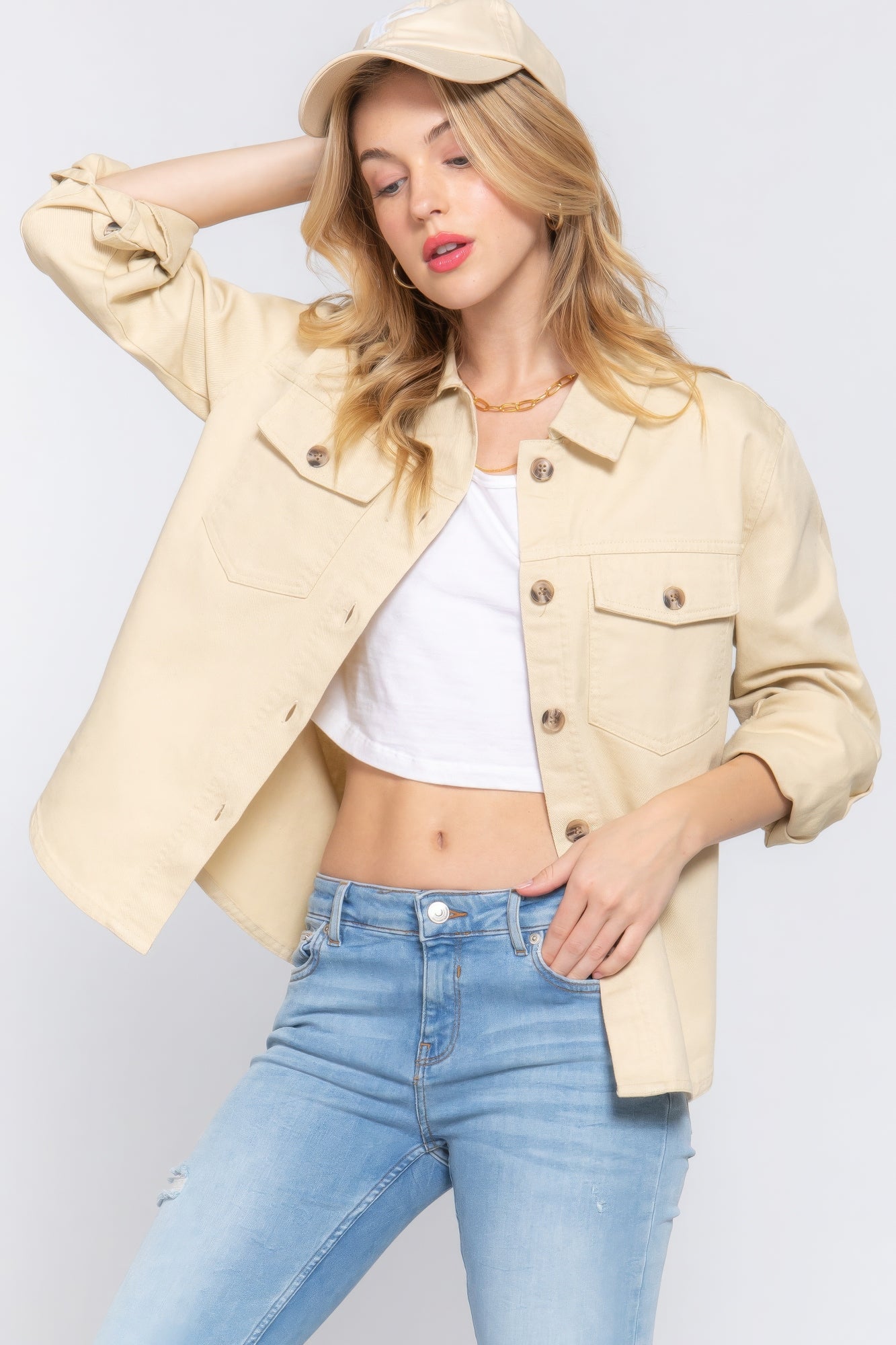Taupe cotton denim shacket with buttoned front and chest flap pockets, long sleeves