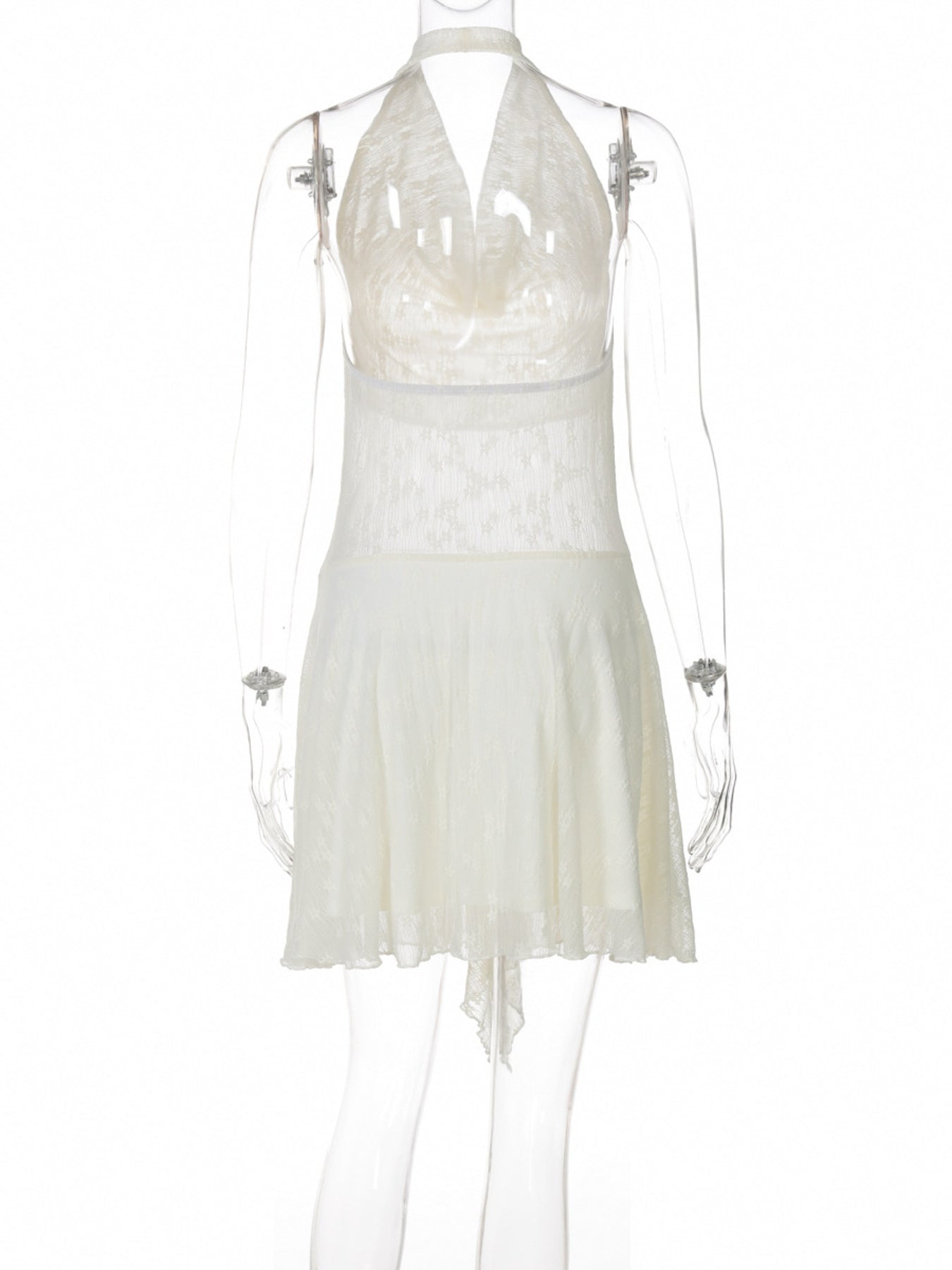 Cream halter neck mini dress, back view: ruched waist and flared asymmetrical hem
