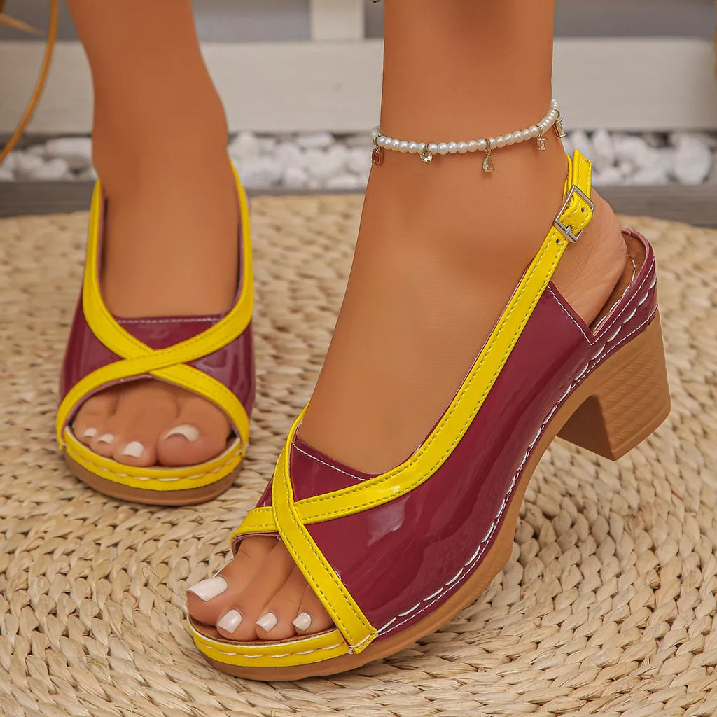 Burgundy open toe block heel sandals with yellow slingback strap and buckle detail