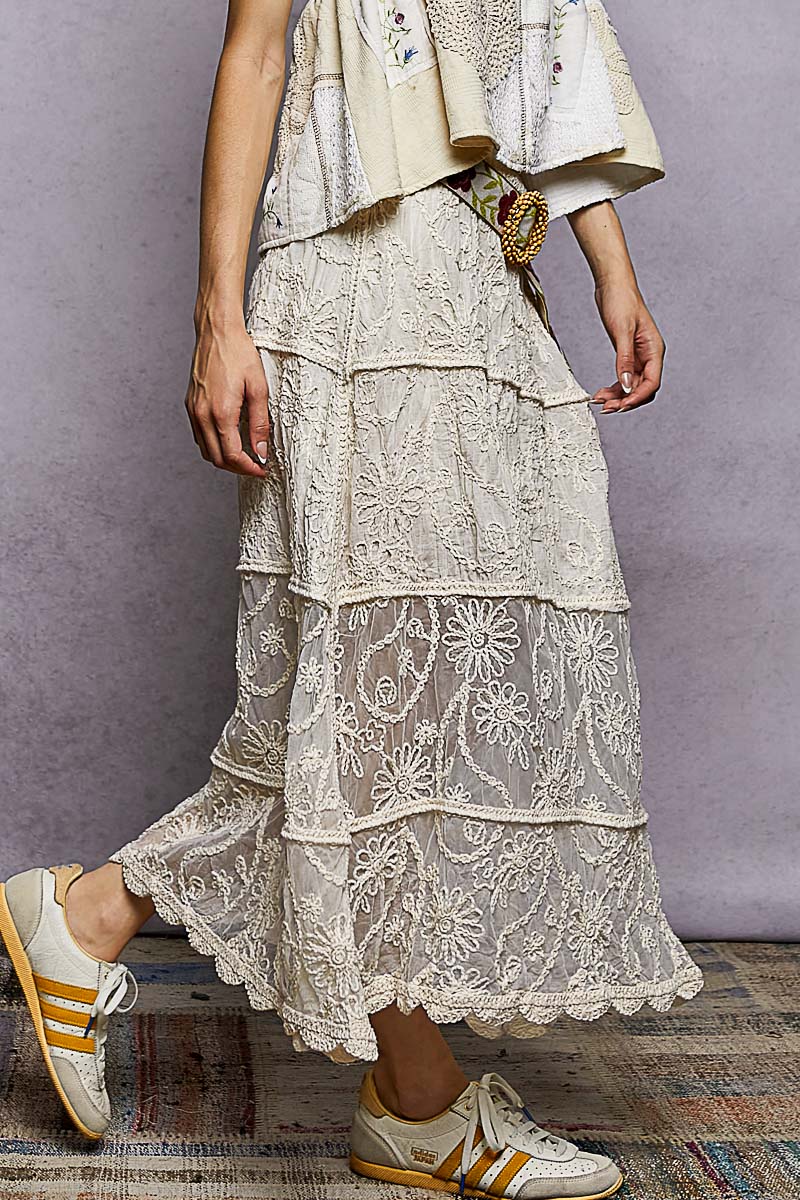 Natural midi tiered lace skirt with scalloped crochet edges and floral motifs