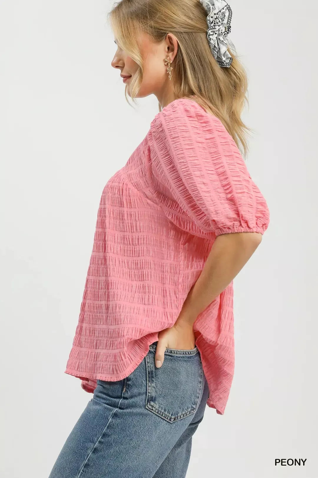 Peony puff-sleeve blouse with textured stripe pattern and gathered hem, side view
