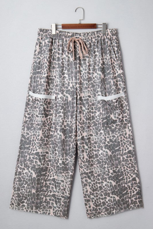 Leopard print drawstring pants, khaki tone, patch pockets and gathered elastic waist