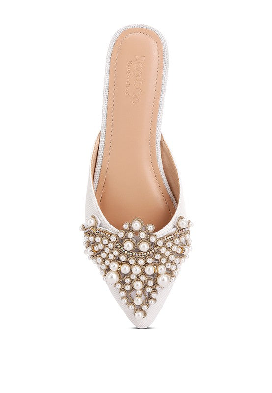 White pointed mule with pearl-embellished vamp and tan leather insole