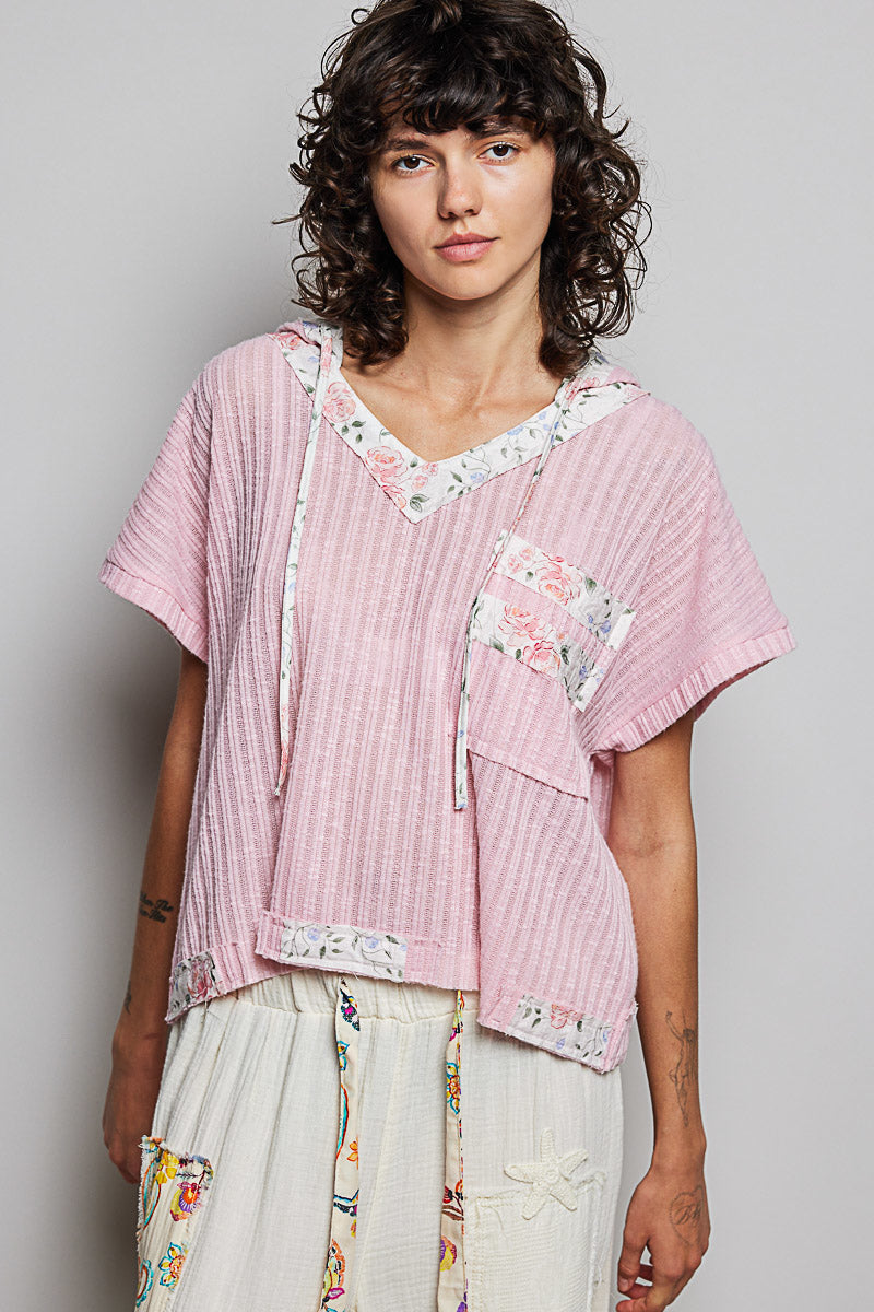 Soft Pink hooded short-sleeve top with floral trim and drawcord neckline