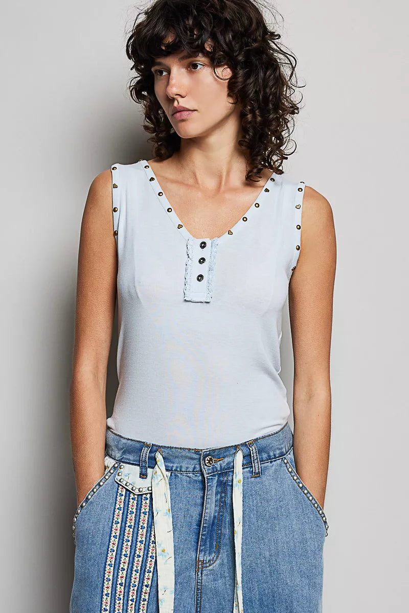 Sleeveless button-front tank with studded V-neck trim and ruffle placket detail