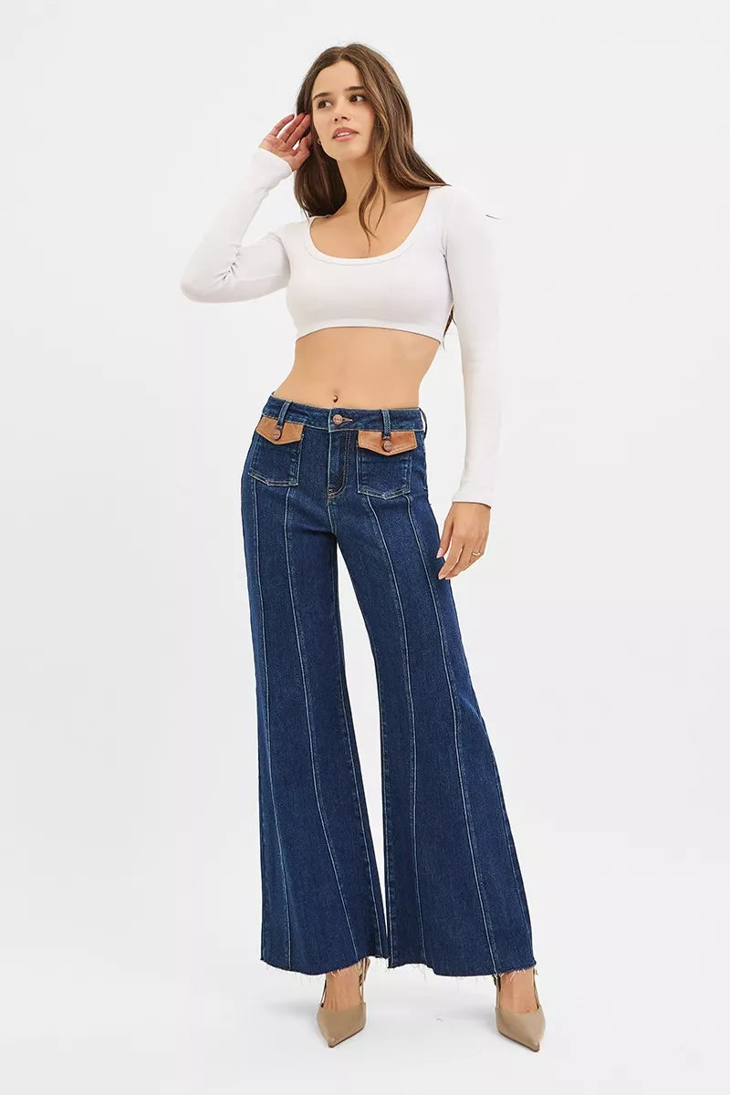 High-rise wide flare jeans with front leather pocket detail, dark denim