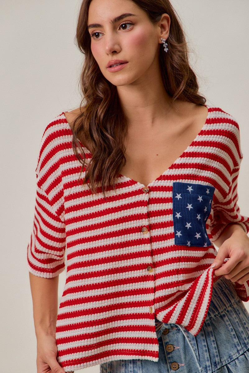 Red-and-ivory striped waffle-knit cardigan top with button front and blue star patch pocket