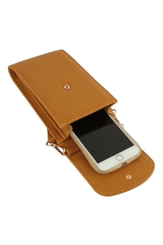 Tan Calin flap cell phone crossbody bag with phone inside and magnetic snap closure