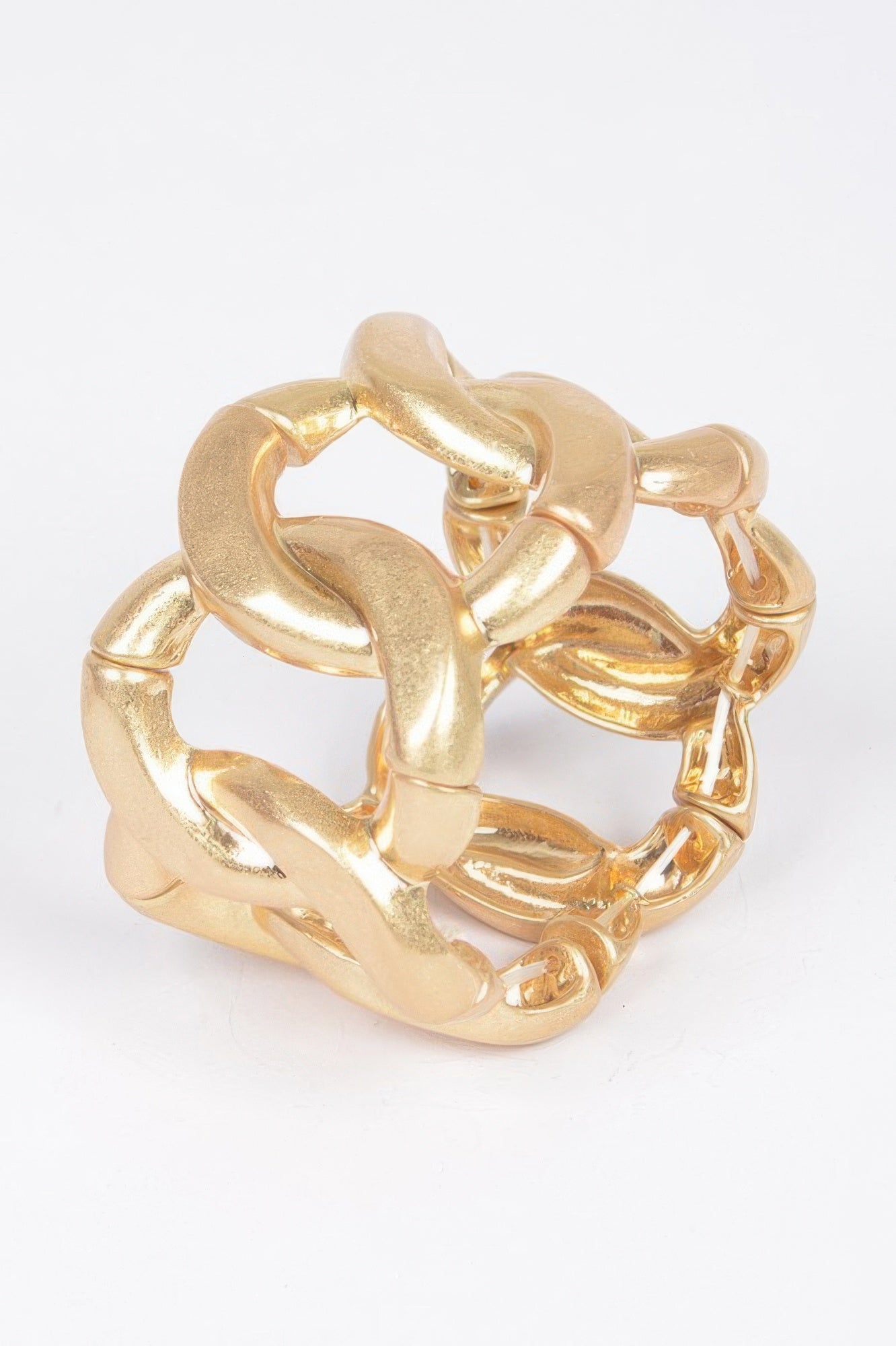 Gold cast metal spring hinge cuff with open loop links, polished finish