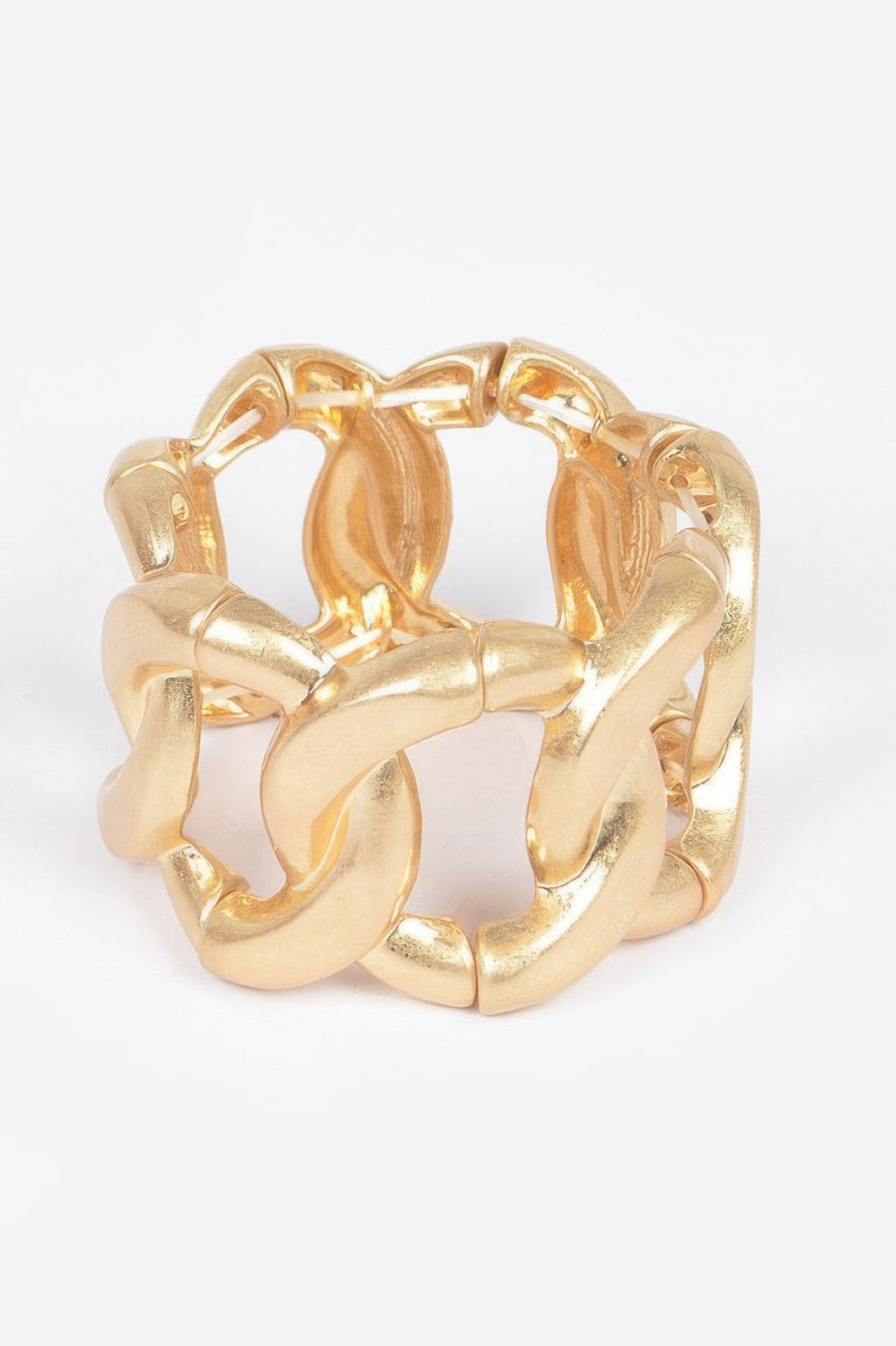 Gold metal spring hinge cuff, chunky linked bracelet style, glossy finish