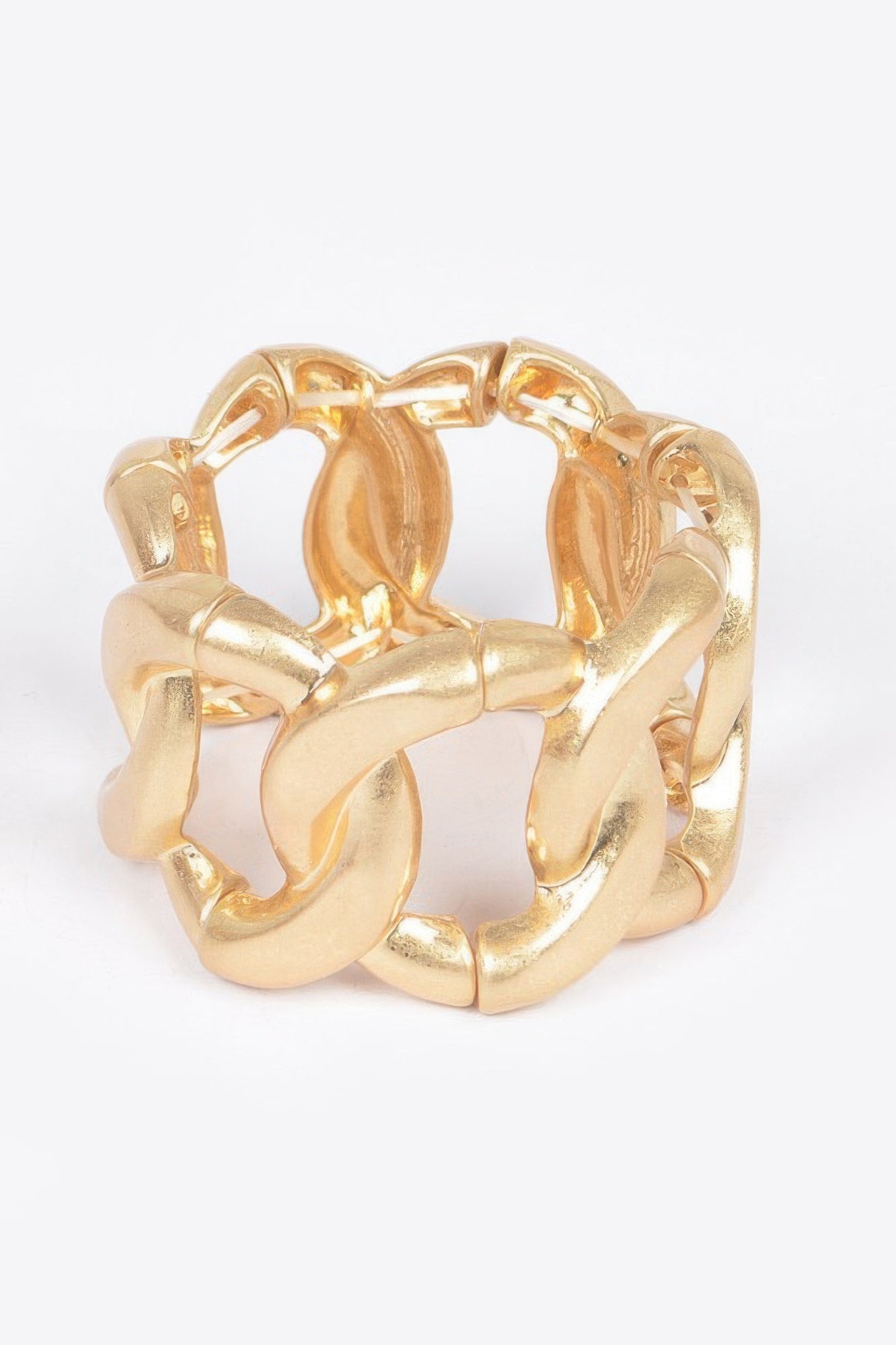Gold metal spring hinge cuff, chunky linked bracelet style, glossy finish