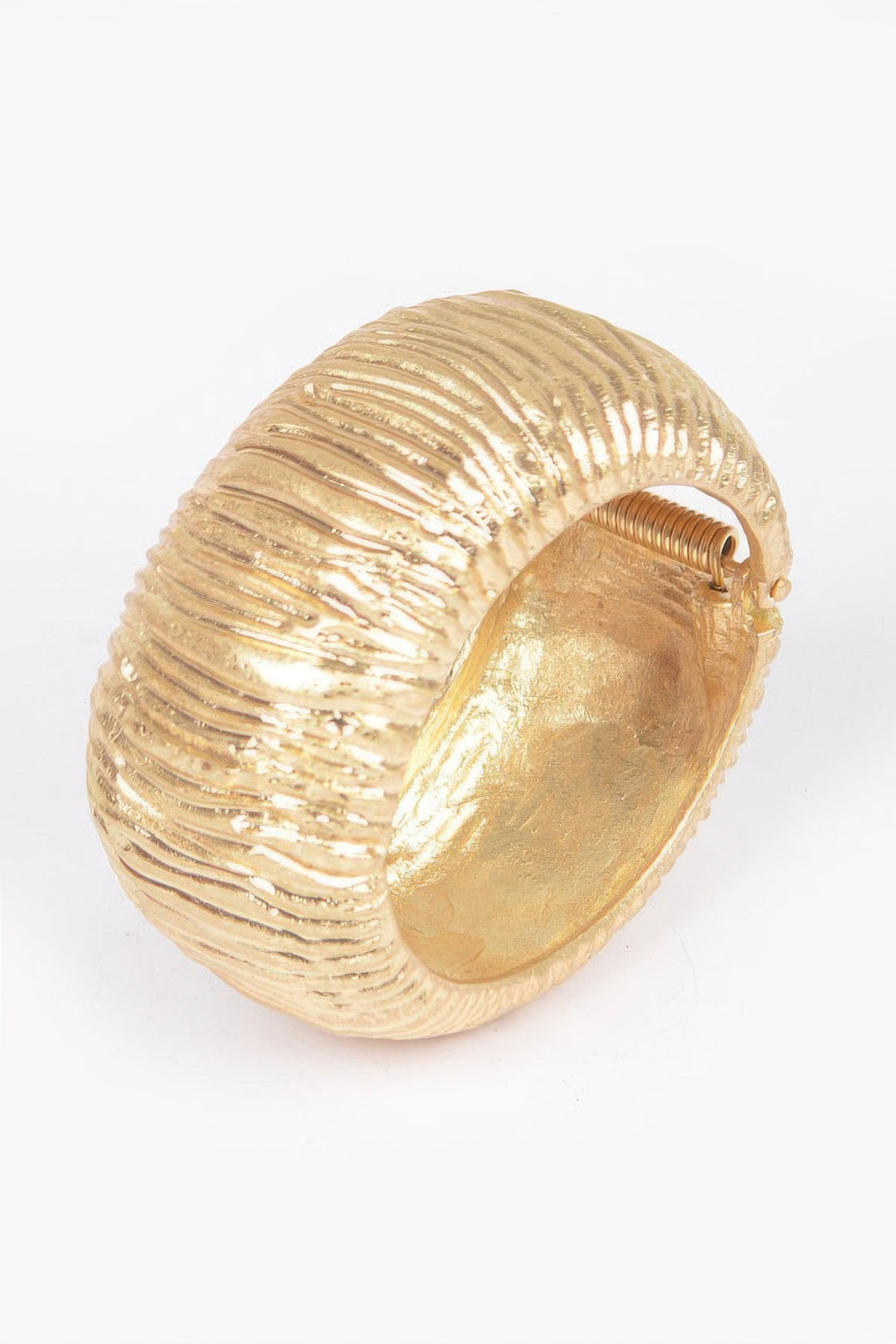 Gold cuff bracelet, rounded ridged band with small clasp hinge
