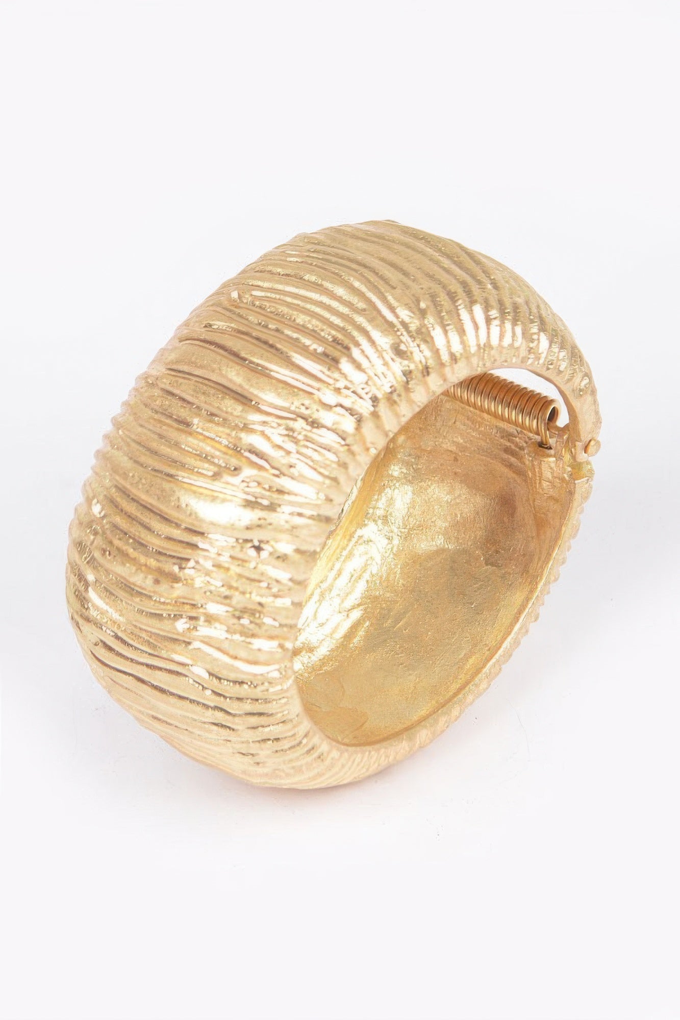 Gold cuff bracelet, rounded ridged band with small clasp hinge