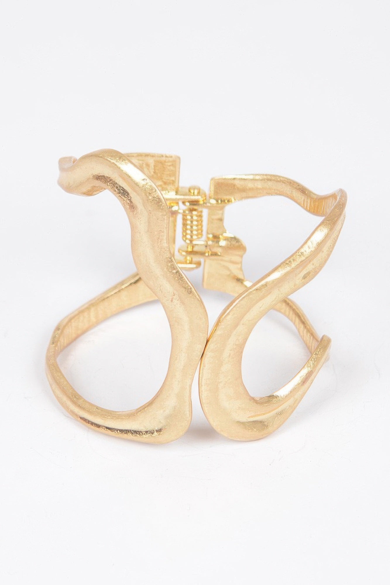 Gold cast metal spring hinge cuff bracelet with open oval links