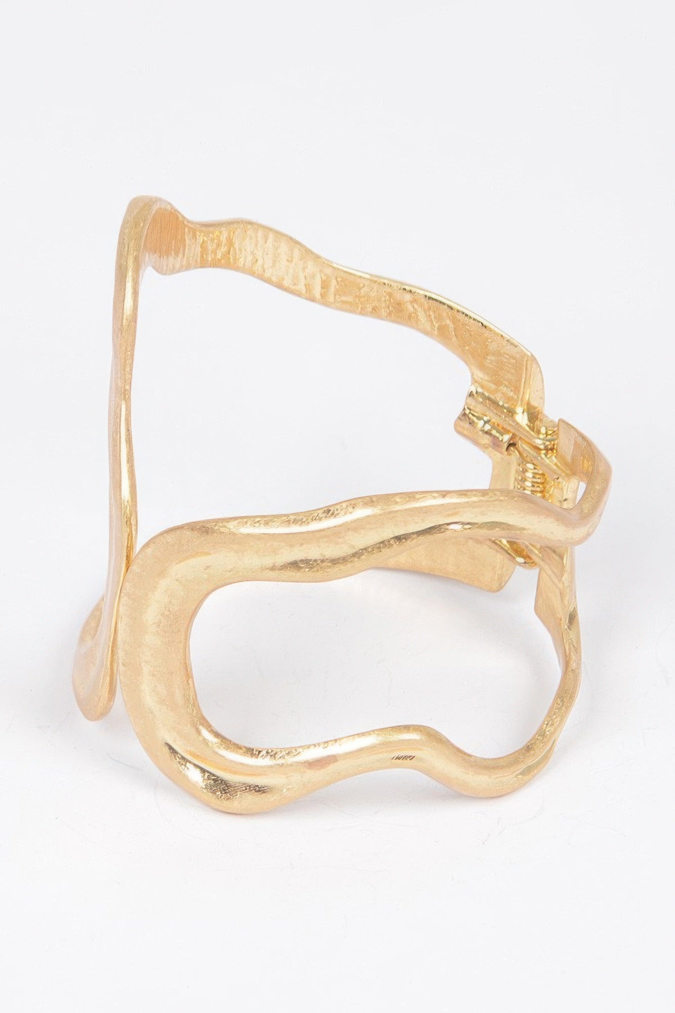 Gold open cuff bracelet, curved sculpted metal links with clasp detail
