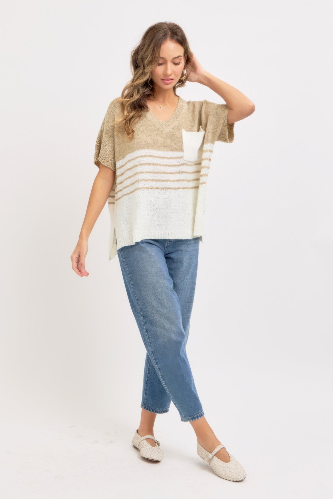 Taupe knit top with V-neck, short sleeves, white pocket and horizontal stripes at hem