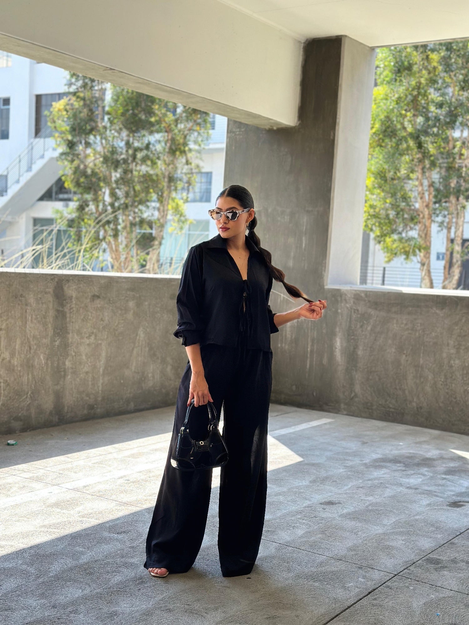 Black wide-leg pants & long-sleeve top with front tie, matching set
