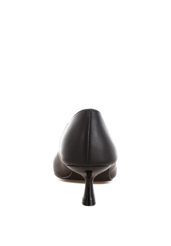 Black pointed-toe pump back view with slim kitten heel