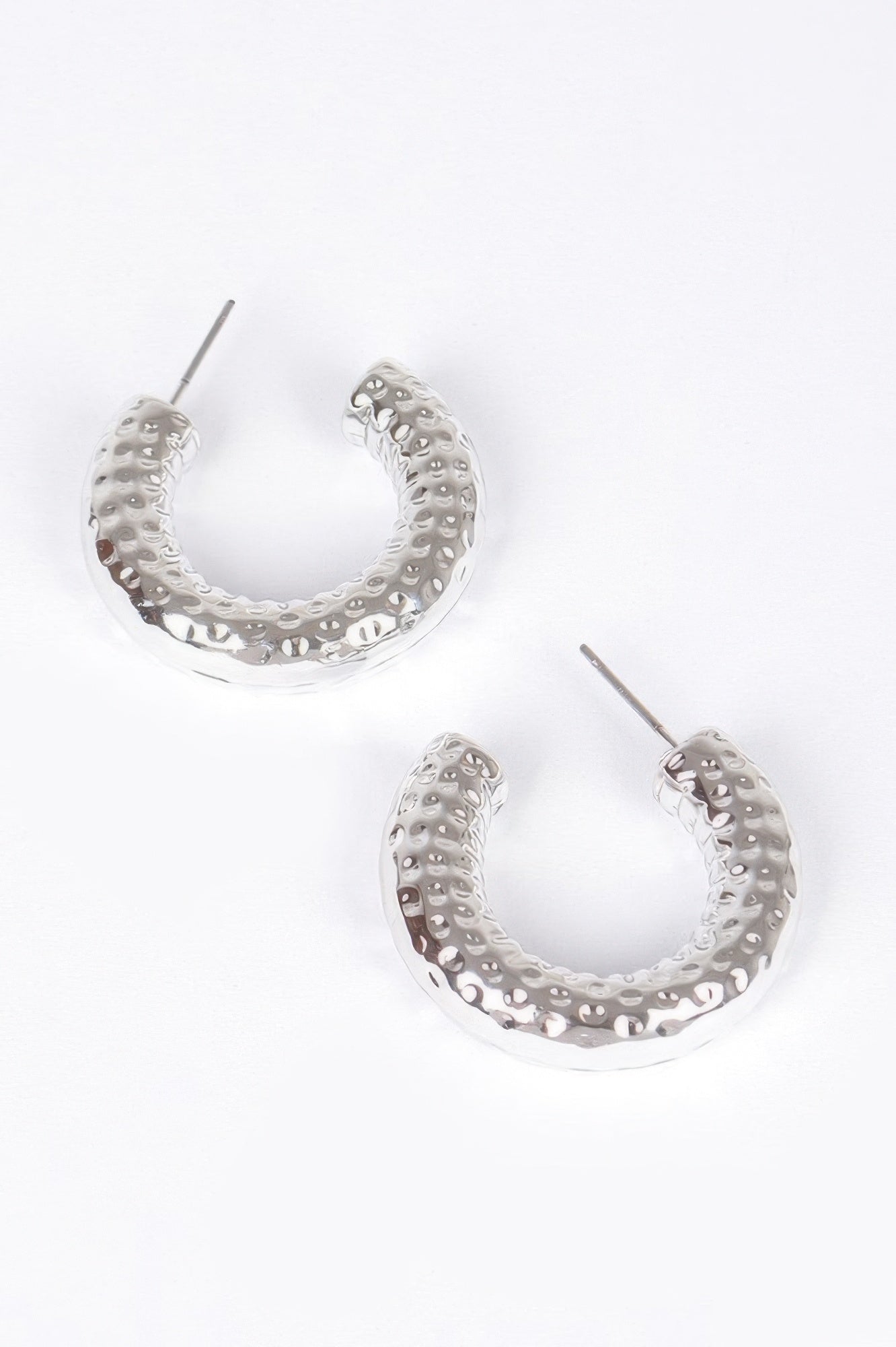 Silver CCb hoop earrings with hammered pattern and thin post studs
