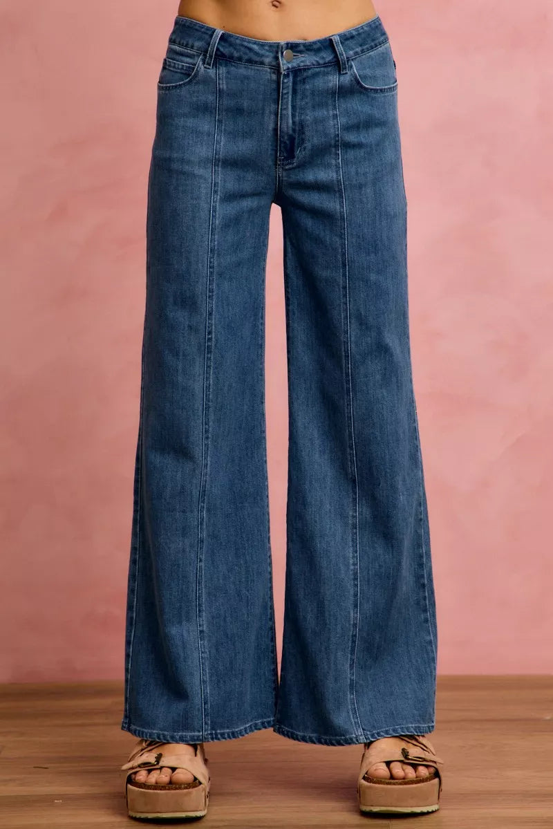 SO ME denim jeans, back view with wide-leg shape and patch pockets at the hips.